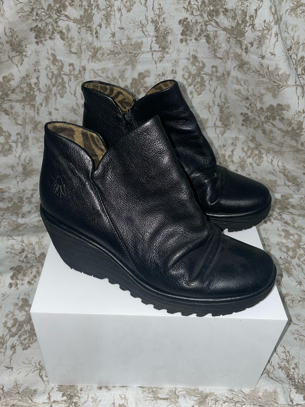 Fly London Black Leather Wedge Ankle Boots with Subtle Ruched Upper